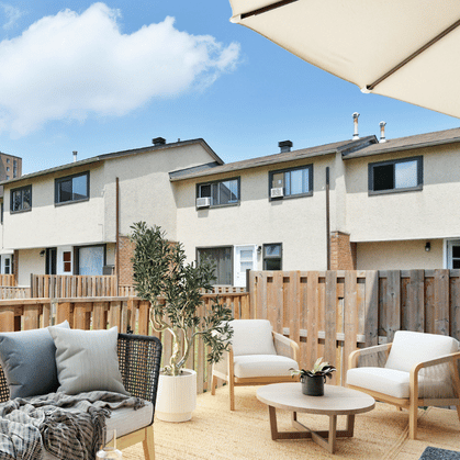 Virtually staged balcony at Navaho Townhomes & Garden Homes.